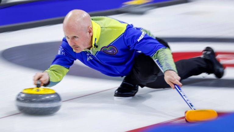 Team Alberta skip Kevin Koe makes a shot at the Tim Hortons Brier in Lethbridge, Alta., Sunday, March 6, 2022. (Jeff McIntosh/THE CANADIAN PRESS)