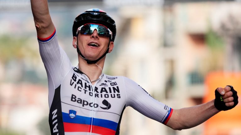 Slovenia's Matej Mohoric celebrates winning the Milan-San Remo in Sanremo, Italy, Saturday, March 19, 2022. (Gian Mattia D'Alberto/LaPresse via AP)
