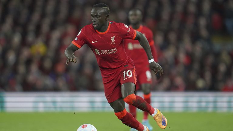 Liverpool's Sadio Mane takes control of the ball during the English Premier League soccer match between Liverpool and West Ham United at Anfield stadium. (Jon Super/AP)