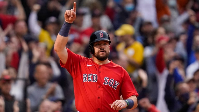 Boston Red Sox Kyle Schwarber reacts after scoring on a single by Rafael Devers against the Tampa Bay Rays during the third inning during Game 3 of a baseball American League Division Series, Sunday, Oct. 10, 2021, in Boston. (Charles Krupa/AP)