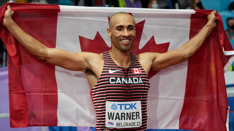 Damian Warner, of Canada, celebrates after winning the Men's heptathlon at the World Athletics Indoor Championships in Belgrade, Serbia, Saturday, March 19, 2022. (Darko Vojinovic/AP)