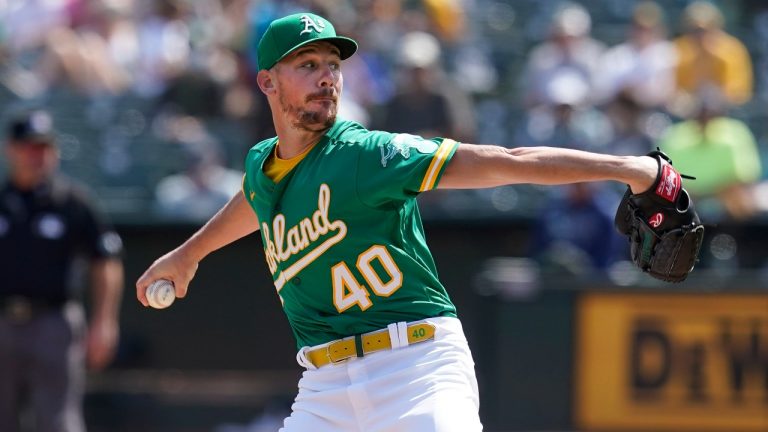 Oakland Athletics' Chris Bassitt pitches against the Seattle Mariners during the first inning of a baseball game in Oakland, Calif., Thursday, Sept. 23, 2021. (Jeff Chiu/AP)