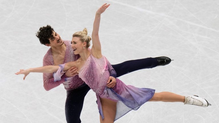 Piper Gilles and Paul Poirier, of Canada, perform in the ice dance free program at the Figure Skating World Championships in Montpellier, south of France, Saturday, March 26, 2022. (Francisco Seco/AP)