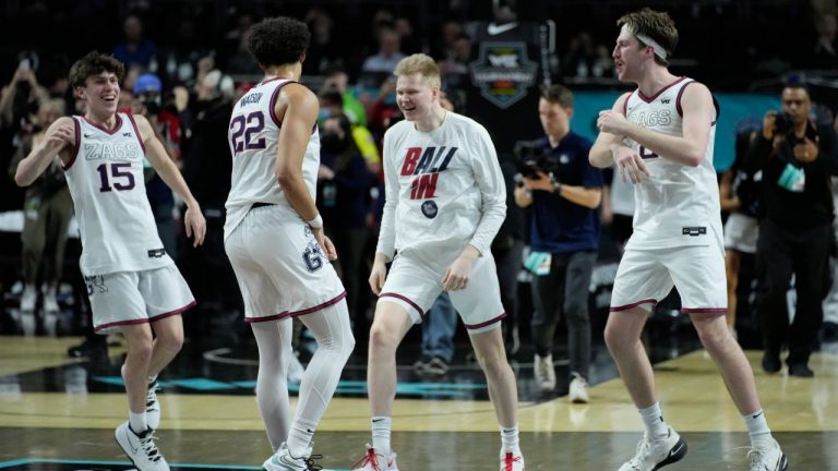 Gonzaga players celebrate after defeating Saint Mary's in an NCAA college basketball championship game at the West Coast Conference tournament Tuesday, March 8, 2022, in Las Vegas. (John Locher/AP)