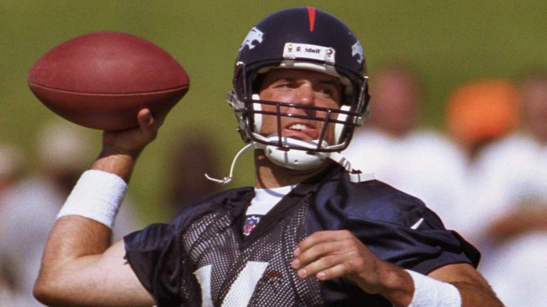 In this July 22, 2000, file photo, Denver Broncos quarterback Brian Griese throws during training camp in Greeley, Colo. (Jack Dempsey/AP)