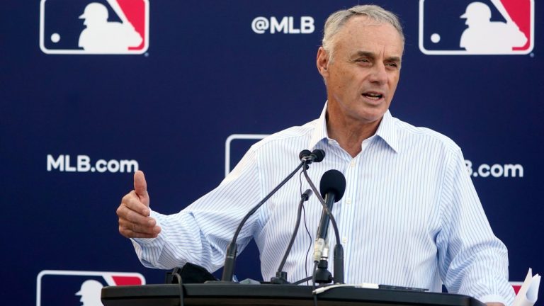Major League Baseball Commissioner Rob Manfred speaks during a news conference after negotiations with the players' association toward a labor deal, Tuesday, March 1, 2022, at Roger Dean Stadium in Jupiter, Fla. Manfred said he is canceling the first two series of the season that was set to begin March 31, dropping the schedule from 162 games to likely 156 games at most. Manfred said the league and union have not made plans for future negotiations. Players won't be paid for missed games. (Wilfredo Lee/AP)