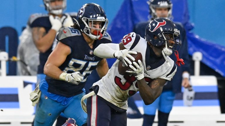 Houston Texans cornerback Terrance Mitchell (39) intercepts a pass against the Tennessee Titans in the fourth quarter of an NFL football game Sunday, Nov. 21, 2021, in Nashville, Tenn.(Mark Zaleski/AP)