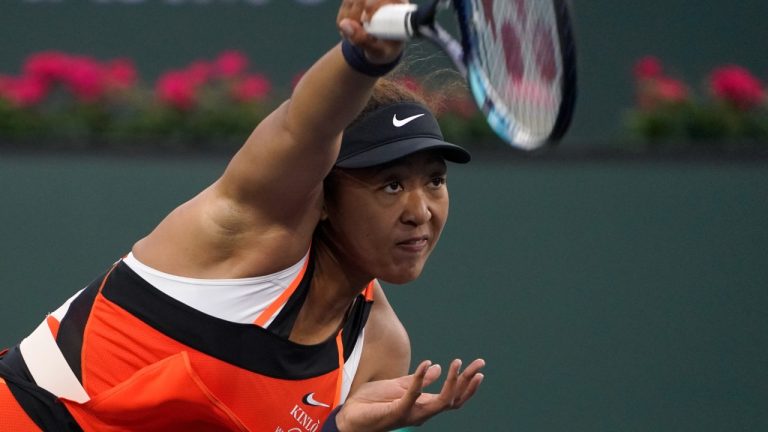 Naomi Osaka, of Japan, serves to Sloane Stephens at the BNP Paribas Open tennis tournament Thursday, March 10, 2022, in Indian Wells, Calif. (Mark J. Terrill/AP)