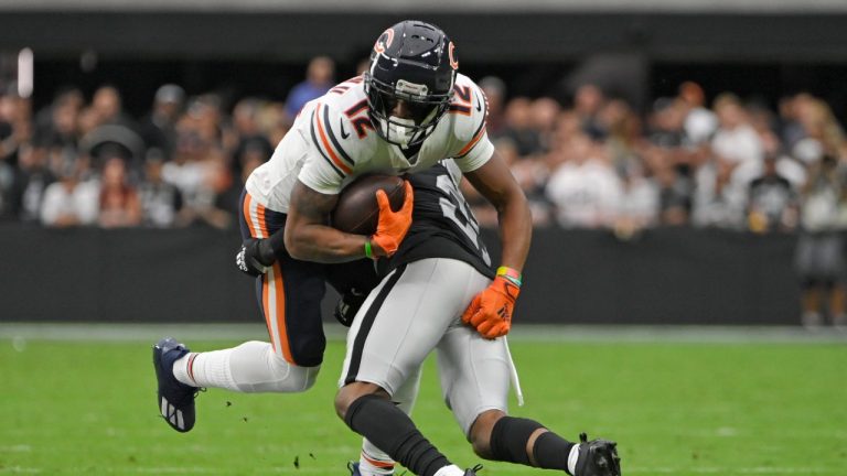 Las Vegas Raiders cornerback Amik Robertson (21) tackles Chicago Bears wide receiver Allen Robinson (12) after Robinson made a catch during the first half of an NFL football game, Sunday, Oct. 10, 2021, in Las Vegas. (David Becker/AP)