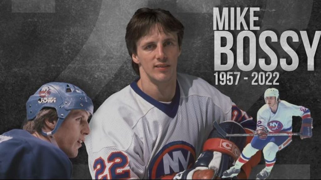 Playoff MVP Mike Bossy holds up the Islanders' third straight