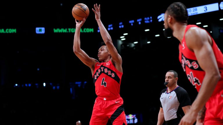 Toronto Raptors forward Scottie Barnes (4) shoots against the Brooklyn Nets during the first half of an NBA basketball game Monday, Feb. 28, 2022, in New York. (Noah K. Murray/AP)