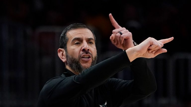Charlotte Hornets head coach James Borrego gestures to players during the first half of the team's NBA play-in basketball game against the Atlanta Hawks on Wednesday, April 13, 2022, in Atlanta. (John Bazemore/AP Photo)