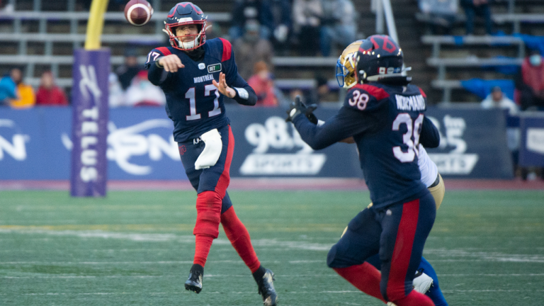 Montreal Alouettes quarterback Trevor Harris (17) throws a pass towards teammate Christophe Normand during second half CFL football action against the Winnipeg Blue Bombers, in Montreal, Saturday, Nov. 13, 2021. (CP/file)
