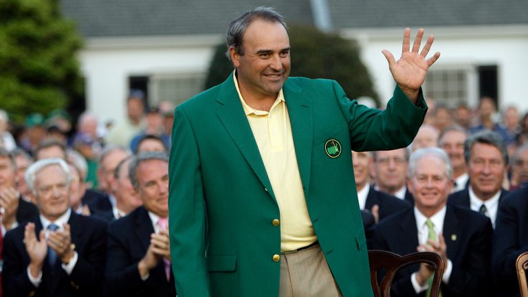 FILE- Masters golf champion Angel Cabrera, of Argentina, waves after receiving his green jacket at the Augusta National Golf Club in Augusta, Ga., on April 12, 2009. As the Masters unfolds this week, 2009 winner Angel Cabrera sits in an Argentinian prison. (Rob Carr/AP)