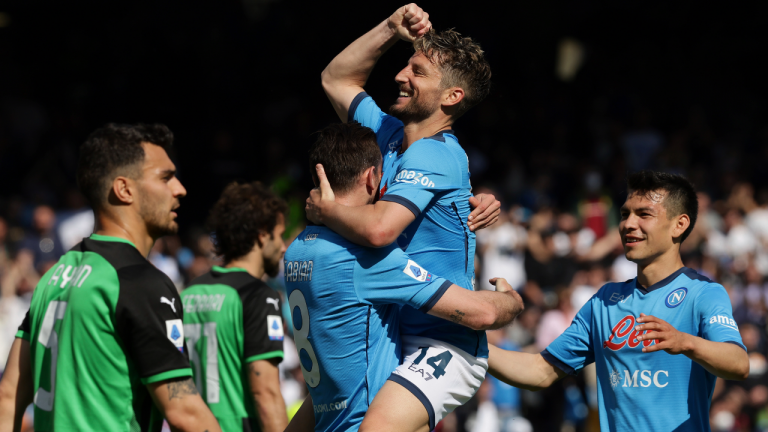 Napoli's Dries Mertens celebrates after scoring his side's fifth goal during a Serie A soccer match between Napoli and Sassuolo, in Naples' Diego Armando Maradona stadium, Italy, Saturday, April 30, 2022. (AP)