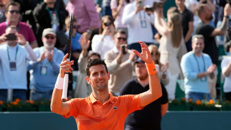 Novak Djokovic of Serbia celebrates winning the semifinal tennis match of the Serbia Open tennis tournament against Russia's Karen Khachanov, in Belgrade, Serbia, Saturday, April 23, 2022. (Darko Vojinovic/AP)