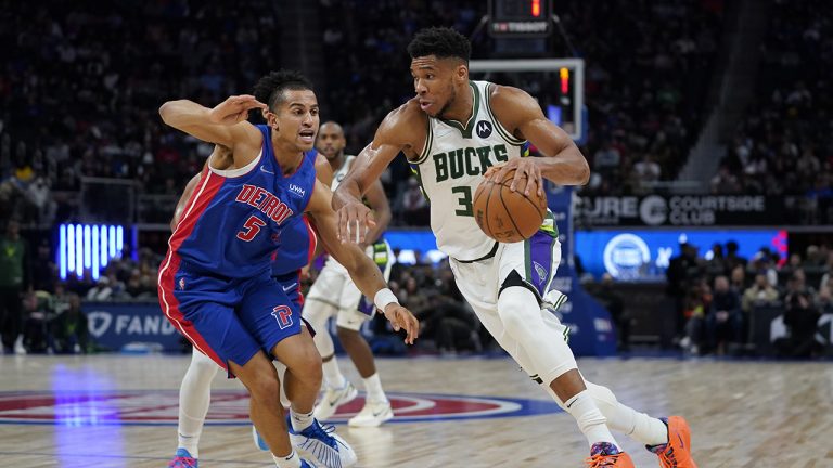 Milwaukee Bucks forward Giannis Antetokounmpo (34) drives on Detroit Pistons guard Frank Jackson (5) in the first half of an NBA basketball game. (Paul Sancya/AP)