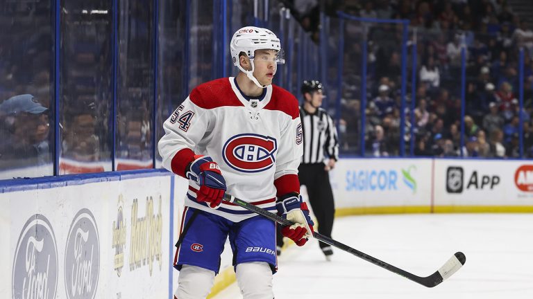 Jordan Harris of the Montreal Canadiens during his NHL debut against the Tampa Bay Lightning. (Photo by Mark LoMoglio/NHLI via Getty Images)