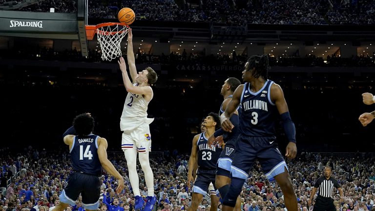 Kansas guard Christian Braun (2) works under the hoop against Villanova guard Caleb Daniels (14) during the second half of a college basketball game. (Brynn Anderson/AP)