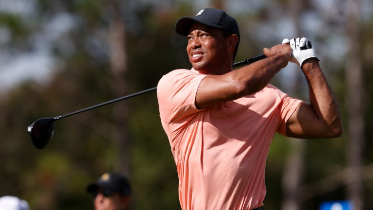 Tiger Woods watches his tee shot on the second hole during the first round of the PNC Championship golf tournament Saturday, Dec. 18, 2021, in Orlando, Fla. (Scott Audette/AP)