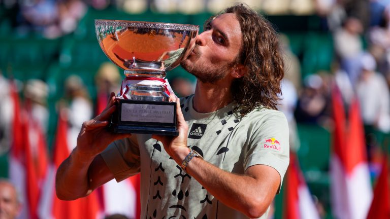 Greece's Stefanos Tsitsipas kisses his trophy after winning the final match of the Monte-Carlo Masters tennis tournament against Spain's Alejandro Davidovich Fokina, Sunday, April 17, 2022 in Monaco. Tsitsipas won 6-3 and 7-6. (Daniel Cole/AP)