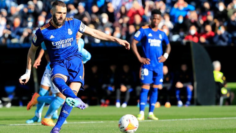 Real Madrid's Karim Benzema scores his side's opening goal during a Spanish La Liga soccer match between Celta Vigo and Real Madrid at the Balaidos stadium in Vigo, Spain, Saturday, April 2, 2022. (Lalo R. Villar/AP)
