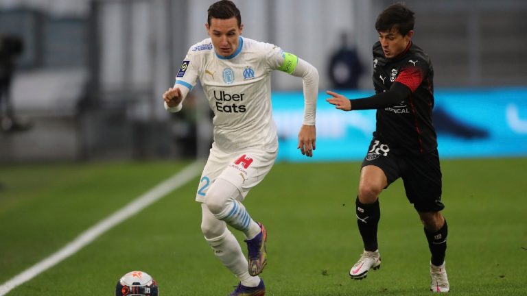 Andres Cubas, right, will be joining the Whitecaps after spending the last two seasons with Nimes in France. (Daniel Cole/AP)