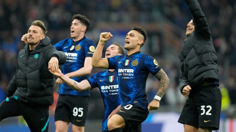 Inter Milan players celebrate their victory after the Serie A soccer match between Inter Milan and Roma at the San Siro Stadium, in Milan, Italy, Saturday, April 23, 2022. (Antonio Calanni/AP)