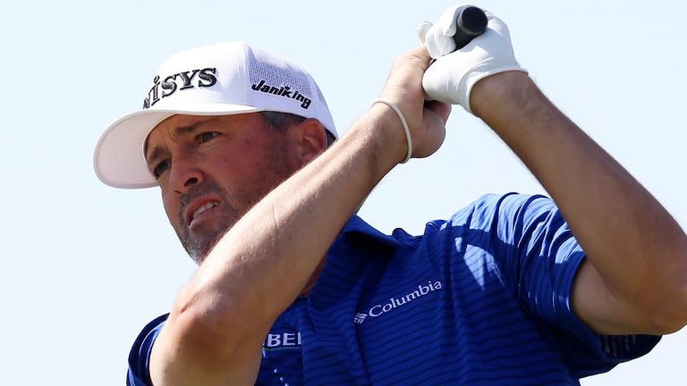 Ryan Palmer watches his shot from the 10th tee during the second day of the Valero Texas Open golf tournament at TPC San Antonio, Friday, April 1, 2022. (Jerry Lara/The San Antonio Express-News via AP)
