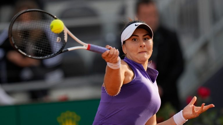 Bianca Andreescu returns the ball to Emma Raducanu during their match at the Italian Open tennis tournament, in Rome, Tuesday, May 10, 2022. (Andrew Medichini/AP Photo)