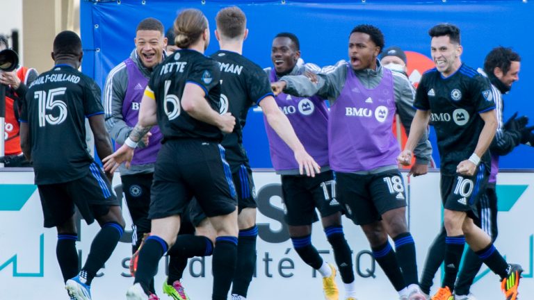 CF Montreal players celebrate a goal by Joaquin Torres (10) against Orlando City during second half MLS soccer action in Montreal, Saturday, May 7, 2022. (Graham Hughes/CP)