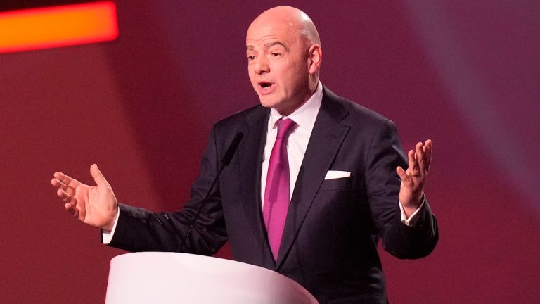 FIFA President Gianni Infantino gestures during the 2022 soccer World Cup draw at the Doha Exhibition and Convention Center in Doha, Qatar, Friday, April 1, 2022. (Darko Bandic/AP)