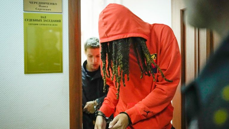 WNBA star and two-time Olympic gold medalist Brittney Griner leaves a courtroom after a hearing, in Khimki just outside Moscow, Russia, Friday, May 13, 2022. Griner, a two-time Olympic gold medalist, was detained at the Moscow airport in February after vape cartridges containing oil derived from cannabis were allegedly found in her luggage, which could carry a maximum penalty of 10 years in prison. (Alexander Zemlianichenko/AP Photo)