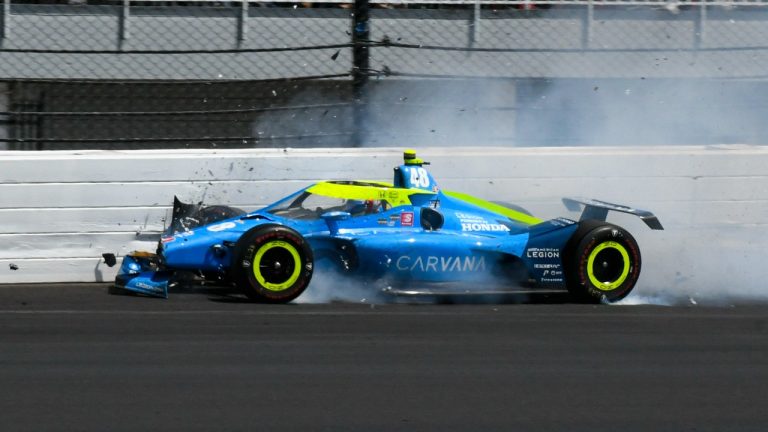 Jimmie Johnson hits the wall in the second turn late in the Indianapolis 500 auto race at Indianapolis Motor Speedway in Indianapolis, Sunday, May 29, 2022. (Greg Huey/AP)