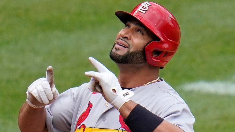 St. Louis Cardinals' Albert Pujols crosses home plate after hitting a solo home run off Pittsburgh Pirates starting pitcher Chase De Jong during the fifth inning of a baseball game in Pittsburgh, Sunday, May 22, 2022. (Gene J. Puskar/AP Photo)