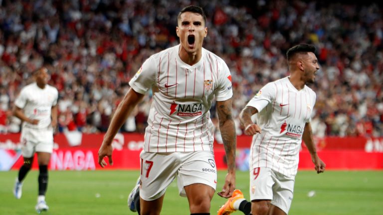 Sevilla's Erik Lamela celebrates after scoring his side's second goal during a Spanish La Liga soccer match between Sevilla and Real Madrid at the Ramon Sanchez Pizjuan stadium, in Seville, Spain, Sunday, April 17, 2022. (Angel Fernandez/AP)