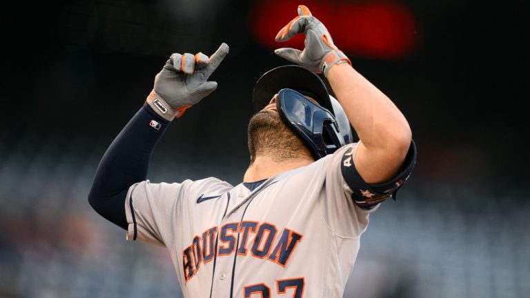 Houston Astros' Jose Altuve celebrates after his home run during the first inning of a baseball game against the Washington Nationals, Friday, May 13, 2022, in Washington. (Nick Wass/AP)
