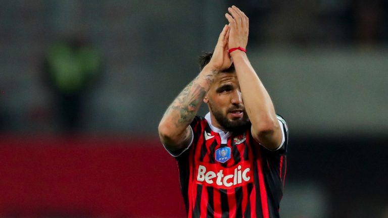 Nice's Andy Delort applauds during the French Cup quarter final soccer match between Nice and Marseille at the Allianz Riviera stadium in Nice, France, Wednesday, Feb. 9, 2022. (Daniel Cole/AP)