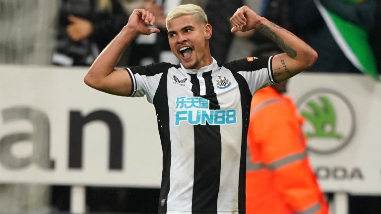Newcastle United's Bruno Guimaraes celebrates scoring during the English Premier League soccer match at St. James' Park, Newcastle upon Tyne, England, Monday May 16, 2022. (Owen Humphreys/PA via AP)