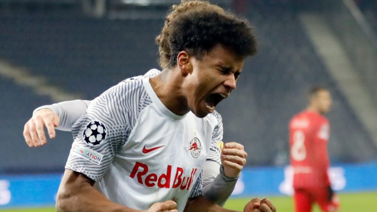 Salzburg's Karim Adeyemi celebrates after Salzburg scored a goal during the Champions League Group G soccer match between RB Salzburg and Sevilla at the Red Bull Arena in Salzburg, Austria, Wednesday, Dec. 8, 2021. (Lisa Leutner/AP)