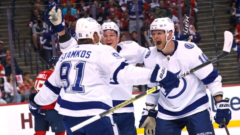 Tampa Bay Lightning center Steven Stamkos (91), right wing Corey Perry (10) and left wing Ondrej Palat (18) celebrate a goal against the Florida Panthers during the first period of Game 2 of an NHL hockey second-round playoff series. (Reinhold Matay/AP)