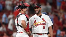 Pujols pitches ninth, allows two homers, as Cardinals roll to big win over Giants