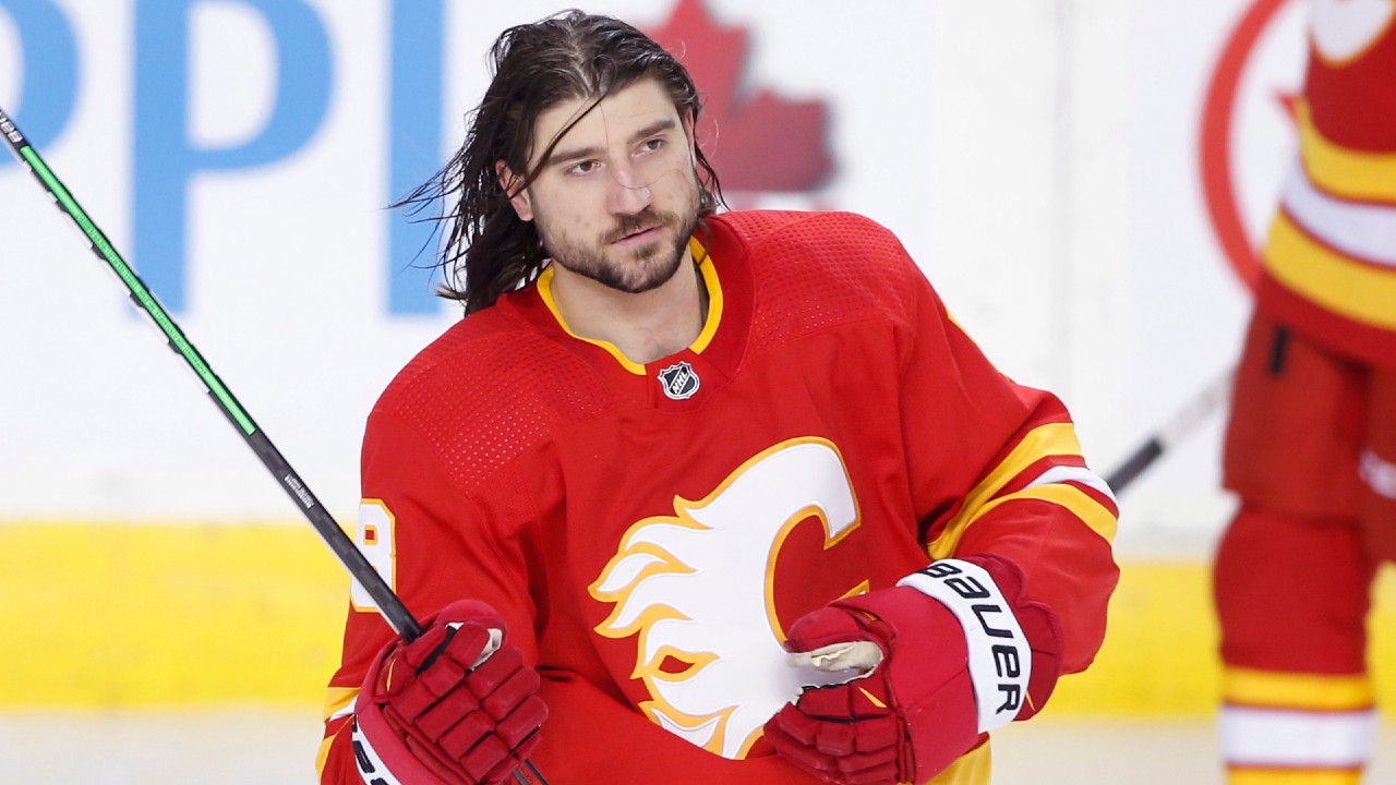 Flames Tanev leaves game after taking shot to head - The San Diego  Union-Tribune