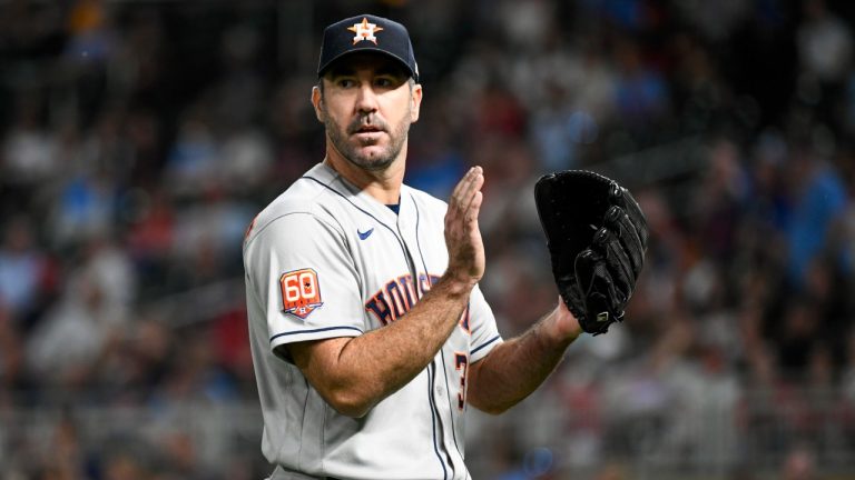 Houston Astros pitcher Justin Verlander reacts after Minnesota Twins' Gilberto Celestino was tagged while trying to steal second base keeping his no hitter alive during the sixth inning of a baseball game, Tuesday, May 10, 2022, in Minneapolis. (Craig Lassig/AP)