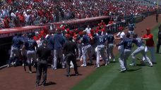 Benches clear, punches are thrown in wild Angels-Mariners brawl