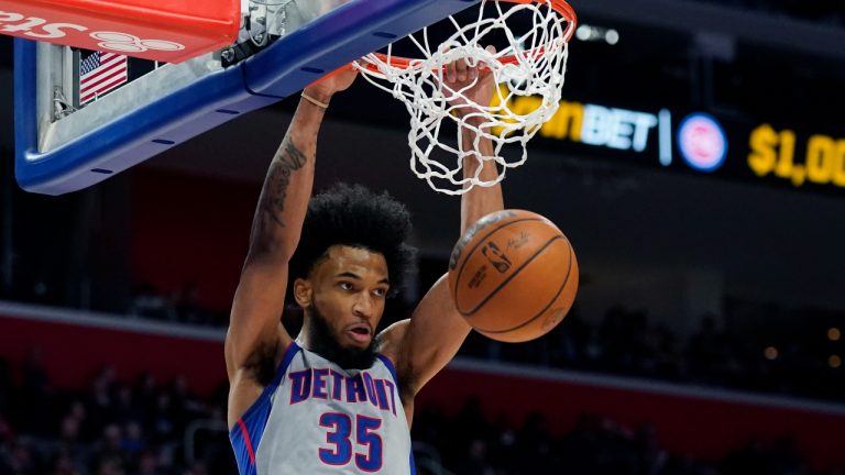 Detroit Pistons forward Marvin Bagley III dunks during the second half of an NBA basketball game against the Los Angeles Clippers, Sunday, March 13, 2022, in Detroit. (AP Photo/Carlos Osorio)