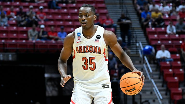 Arizona center Christian Koloko (35) dribbles against Wright State during the first half of a first-round NCAA college basketball tournament game. (Denis Poroy/AP)