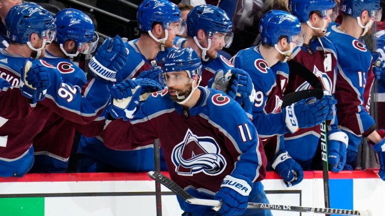 Colorado Avalanche centre Andrew Cogliano (11) is congratulated for a goal against the Edmonton Oilers during the second period in Game 1 of the NHL hockey Stanley Cup playoffs Western Conference finals Tuesday, May 31, 2022, in Denver. (Jack Dempsey/AP)