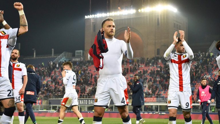 From left, Genoa's Stefano Sturaro, Domenico Criscito, Toni Sanabria and Edoardo Goldaniga celebrate their side's 3-0 win at the end of the Serie A soccer match between Bologna and Genoa, at the Renato dall'Ara Stadium in Bologna, Italy, Saturday, Feb. 15, 2020. (Massimo Paolone/Lapresse via AP)