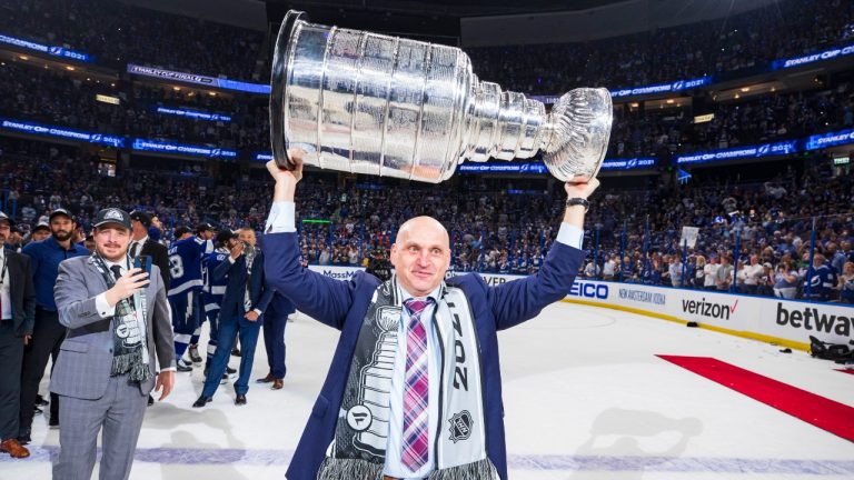 Derek Lalonde, Assistant Coach of the Tampa Bay Lightning hoists the Stanley Cup overhead after the Tampa Bay Lightning defeated the Montreal Canadiens in Game Five to win the best of seven game series 4-1 during the Stanley Cup Final of the 2021 Stanley Cup Playoffs at Amalie Arena on July 7, 2021 in Tampa, Florida. (Scott Audette/NHLI via Getty Images)